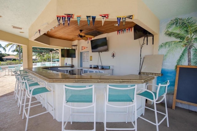 2488 SW Longwood Dr, Palm City, FL 34990 - view of patio featuring visible vents, ceiling fan, and outdoor wet bar