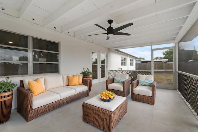 sunroom / solarium with french doors, beamed ceiling, ceiling fan, and outdoor lounge area