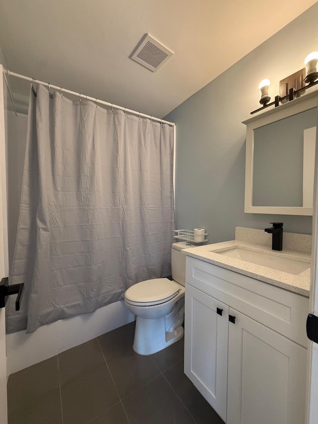 full bathroom with vanity, visible vents, shower / bath combo, tile patterned flooring, and toilet