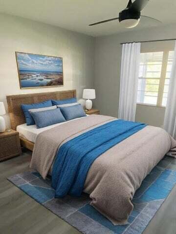 bedroom featuring a ceiling fan and wood finished floors