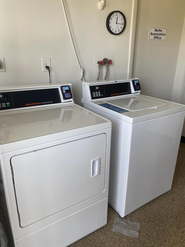 common laundry area featuring washing machine and dryer