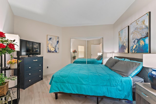 bedroom featuring light wood finished floors