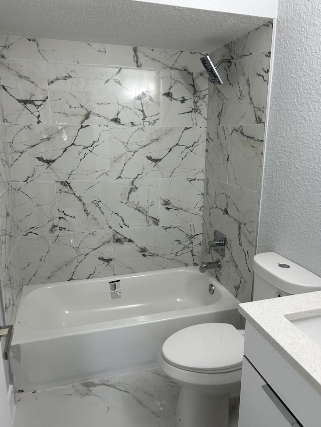 bathroom with vanity, bathtub / shower combination, a textured ceiling, toilet, and a textured wall