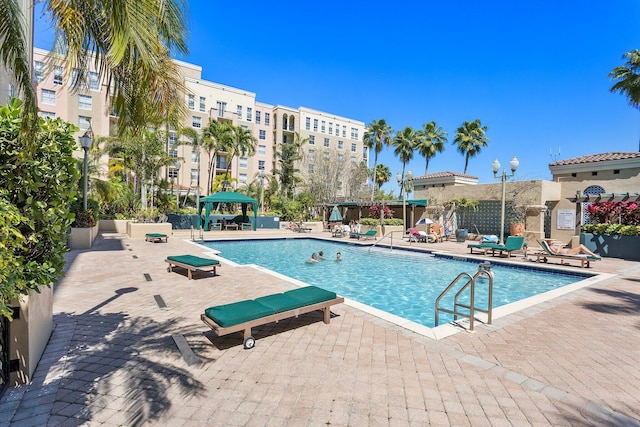 pool with a patio area