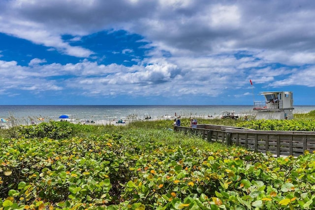 view of water feature with a beach view