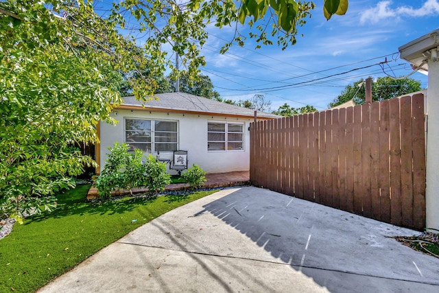 view of patio with fence