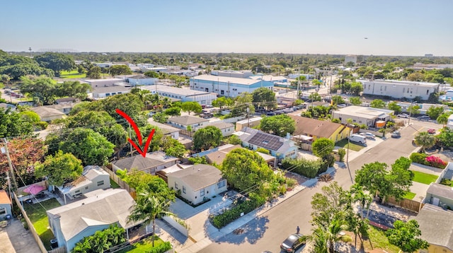 birds eye view of property with a residential view