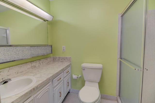 full bath featuring tile patterned floors, an enclosed shower, toilet, and vanity