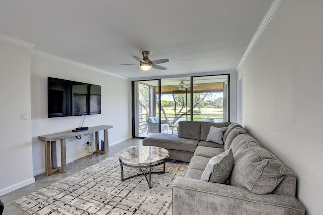 living area with light wood finished floors, ceiling fan, baseboards, a wall of windows, and ornamental molding