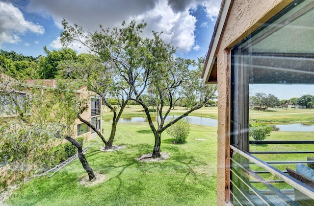 view of yard with a water view