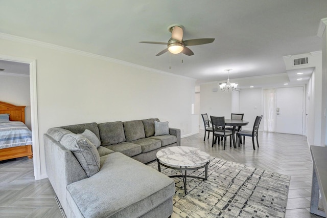 living area featuring ceiling fan with notable chandelier, visible vents, and ornamental molding