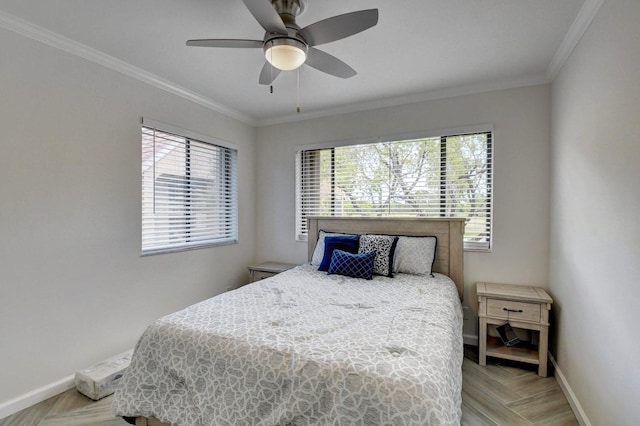 bedroom with baseboards, ceiling fan, and crown molding