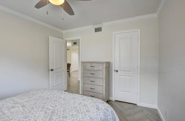 bedroom with visible vents, baseboards, ceiling fan, and crown molding