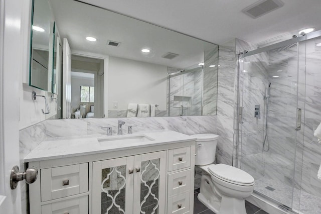 full bath featuring visible vents, toilet, and vanity