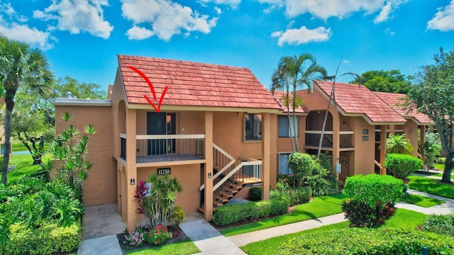 view of property with stairs