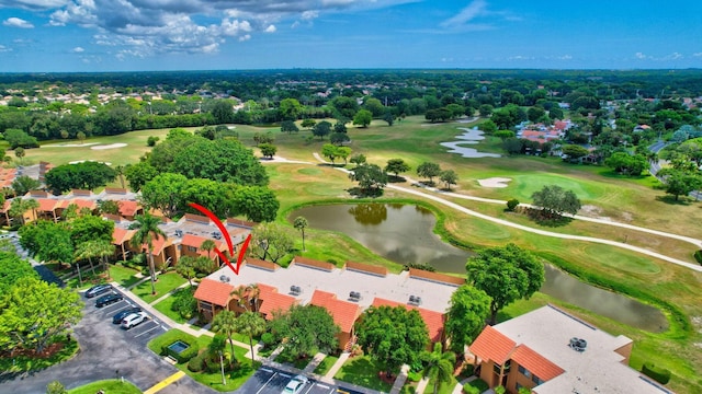 aerial view featuring a water view and view of golf course