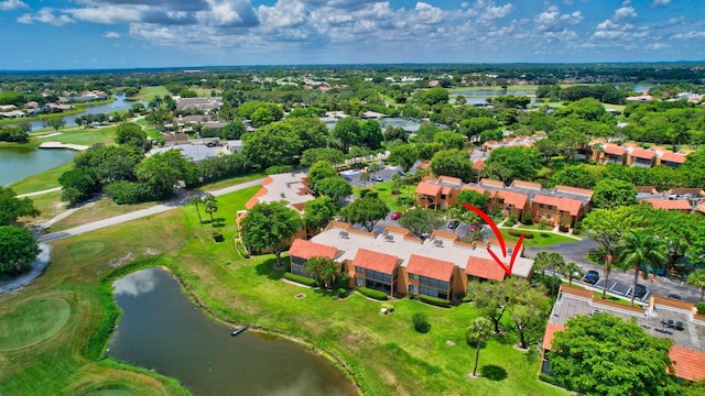 bird's eye view with a water view and a residential view