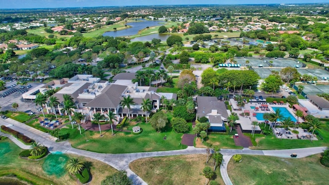 birds eye view of property with a residential view and a water view