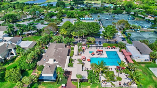 drone / aerial view with a water view and a residential view