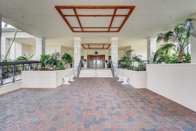 property entrance featuring french doors