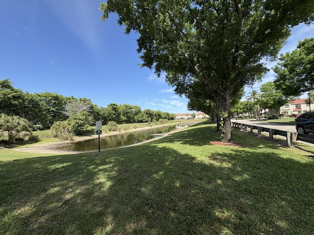 view of yard with a water view