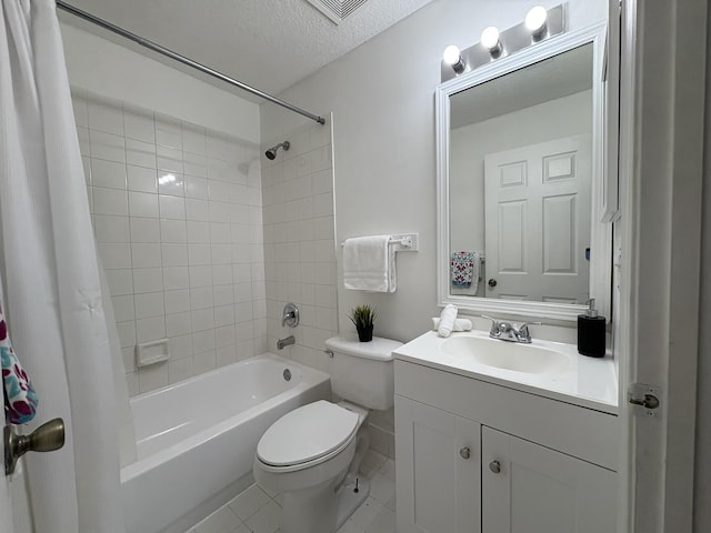 bathroom with toilet, vanity, tile patterned floors, shower / bath combination with curtain, and a textured ceiling