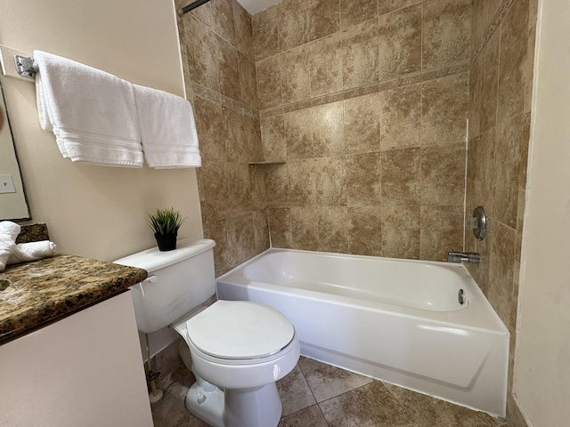 bathroom featuring vanity, tile patterned floors, toilet, and shower / washtub combination