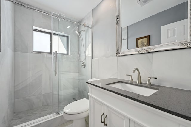 bathroom featuring decorative backsplash, a shower stall, toilet, and visible vents