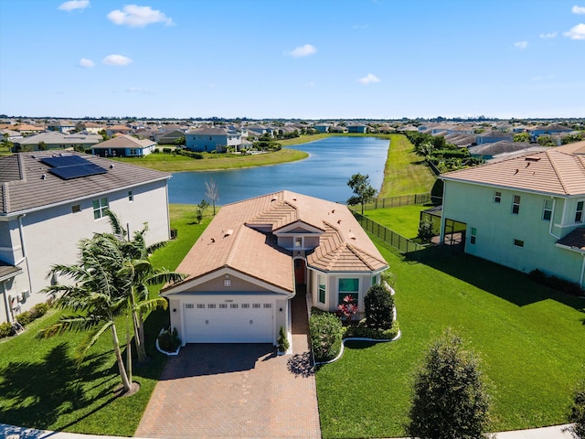 bird's eye view with a water view and a residential view