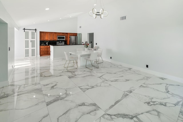 unfurnished dining area with visible vents, recessed lighting, high vaulted ceiling, and an inviting chandelier