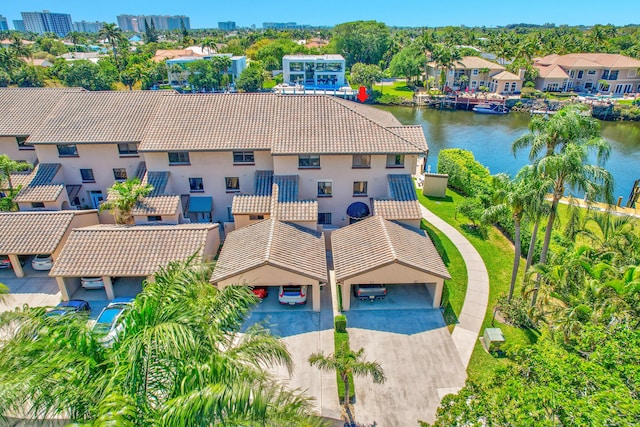 aerial view with a water view and a residential view