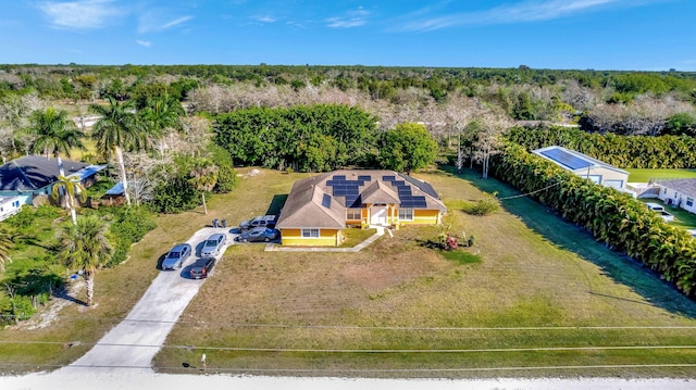 aerial view with a wooded view