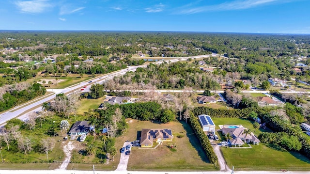 aerial view featuring a view of trees