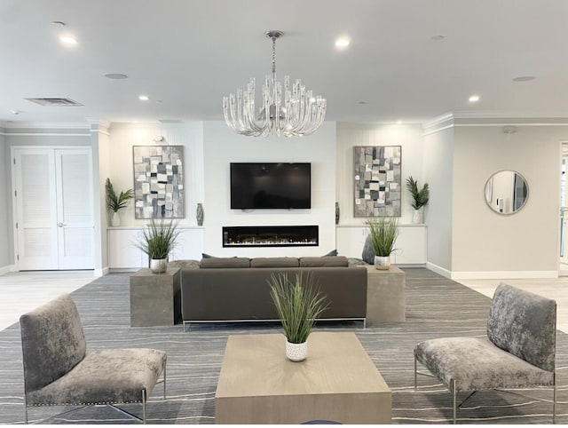 living area featuring visible vents, recessed lighting, crown molding, and an inviting chandelier