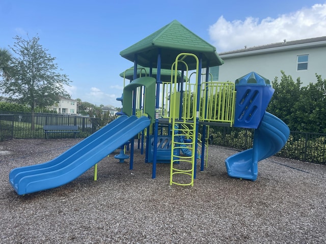 community jungle gym with fence