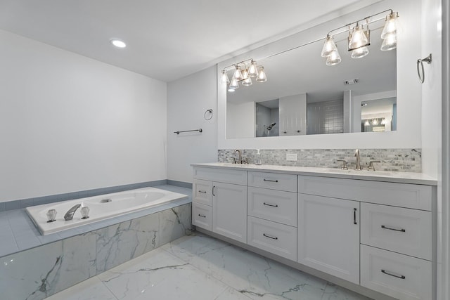 bathroom with a sink, visible vents, backsplash, and marble finish floor