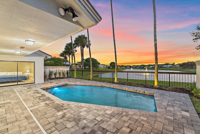 view of pool featuring a fenced in pool, a fenced backyard, and a patio area