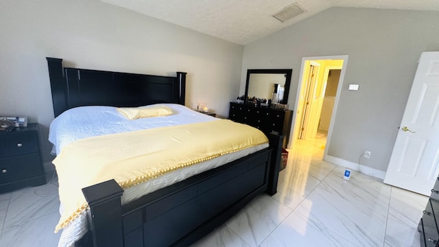 bedroom featuring visible vents, baseboards, lofted ceiling, a textured ceiling, and marble finish floor