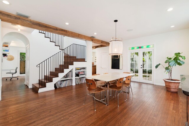 dining space with visible vents, beamed ceiling, hardwood / wood-style flooring, recessed lighting, and french doors