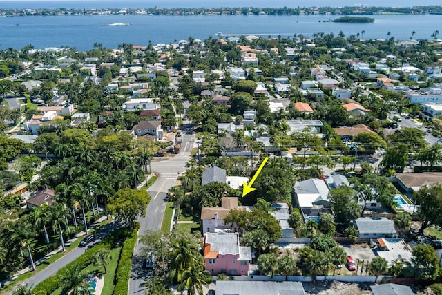 aerial view featuring a residential view and a water view