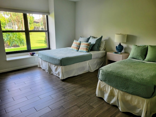 13321 Polo Club Rd Unit C103, Wellington, FL 33414 - bedroom with dark wood-style flooring