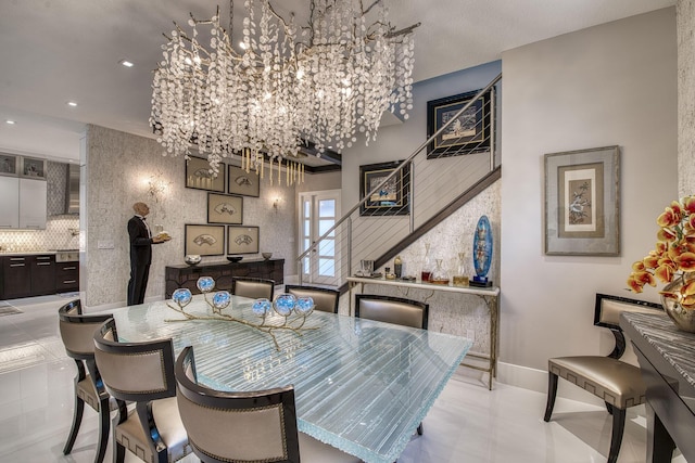 dining room featuring stairway, recessed lighting, and baseboards