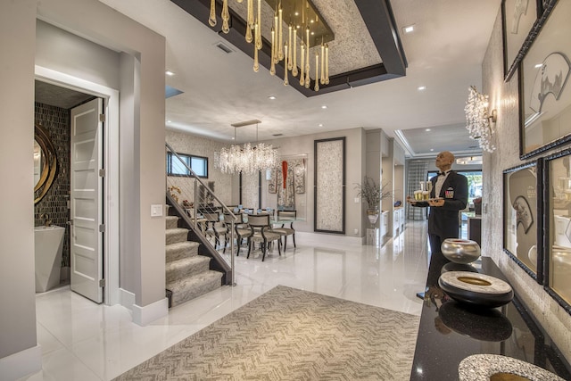 entryway featuring visible vents, a chandelier, stairway, recessed lighting, and marble finish floor