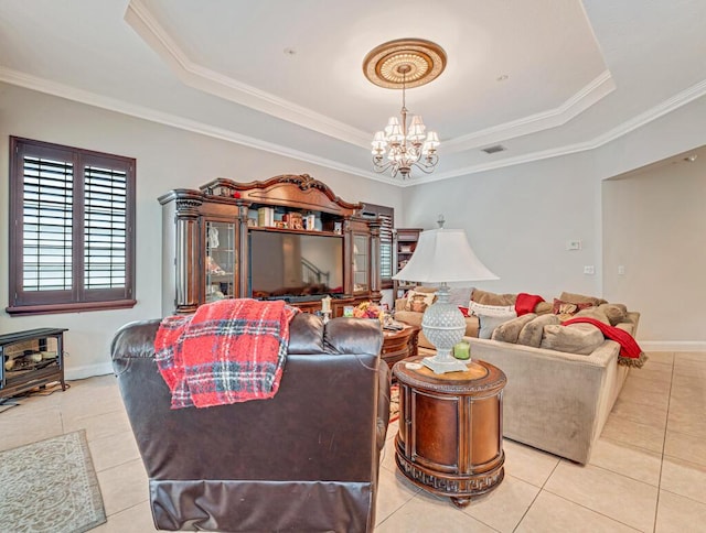 living area featuring light tile patterned floors, visible vents, an inviting chandelier, a tray ceiling, and crown molding