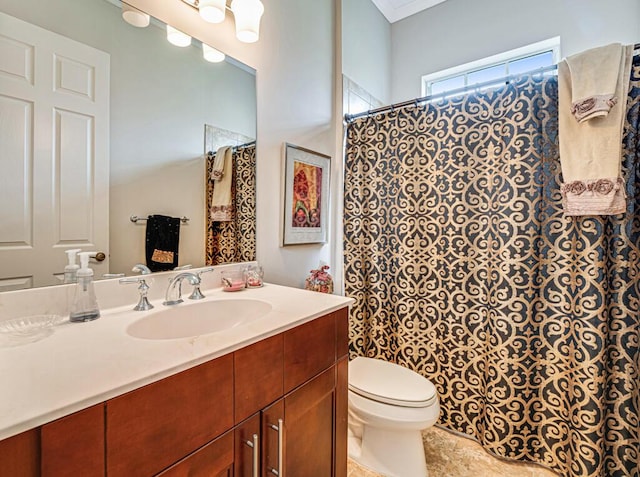 bathroom featuring a shower with curtain, toilet, vanity, and tile patterned flooring