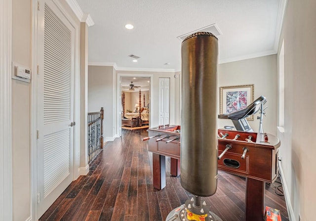 playroom featuring recessed lighting, hardwood / wood-style flooring, baseboards, and ornamental molding