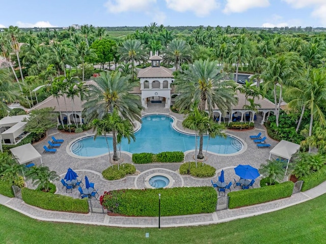 pool featuring a patio area and a community hot tub