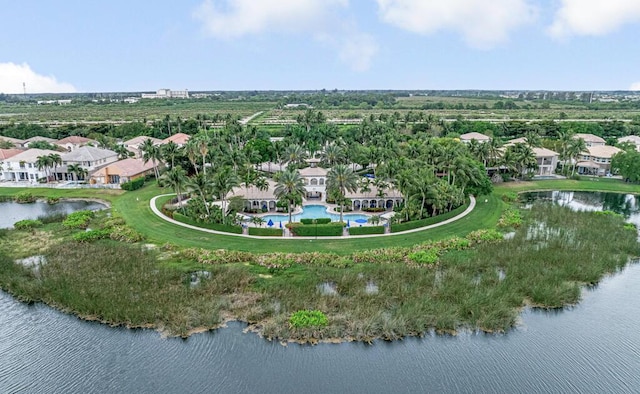 birds eye view of property featuring a residential view and a water view