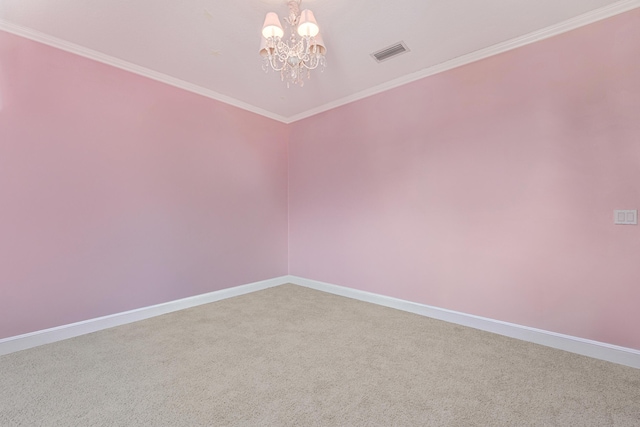 spare room with baseboards, visible vents, carpet floors, an inviting chandelier, and ornamental molding