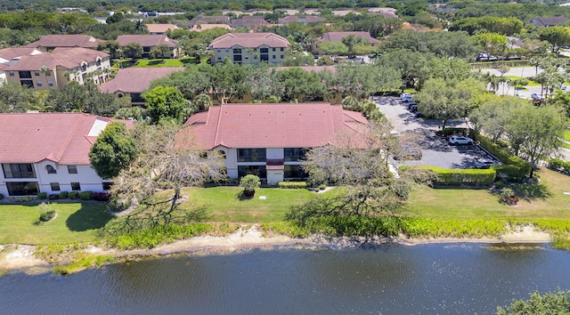 aerial view featuring a water view and a residential view